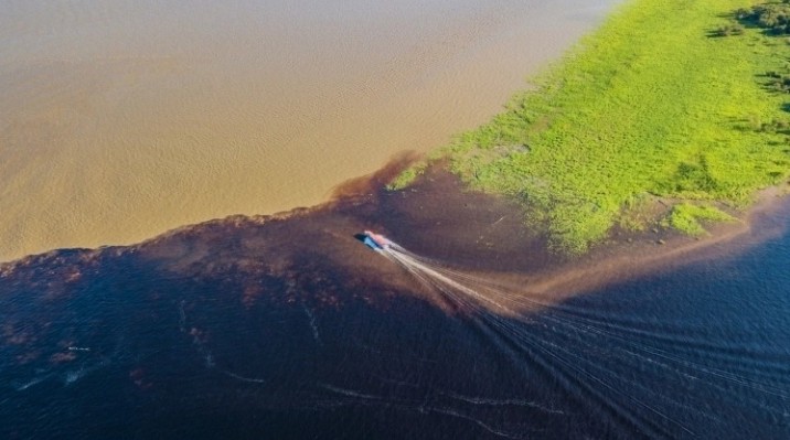 Speedboat on the Meeting of the Waters